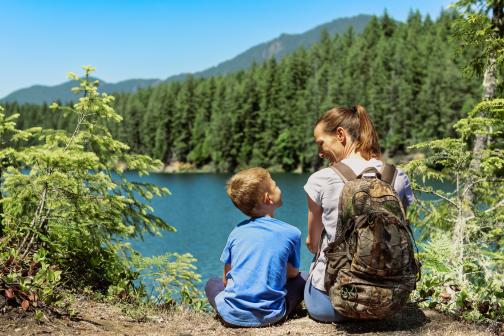 Mother and child taking a break from a nature hike