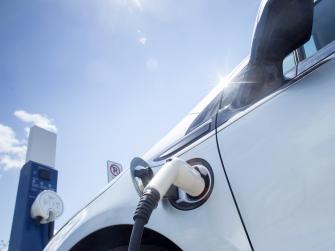 Electric car being charged