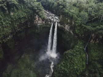 A scenic overhead shot of a waterfall in Indonesia