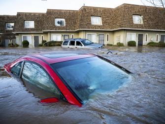 Cars in California submerged in flood waters