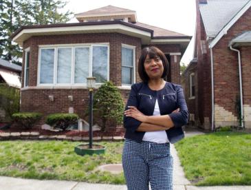 Cheryl Watson standing in her front yard