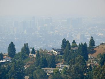 iew of downtown Oakland obscured by smoke as seen from Grizzly Peak Blvd. in Oakland, California.