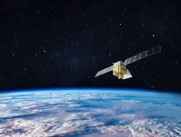 An artist’s rendering of MethaneSAT, a satellite EDF is building to track and measure methane worldwide, in orbit above Earth with a starry sky in the background.