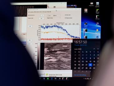 Computer screen showing graph and data.