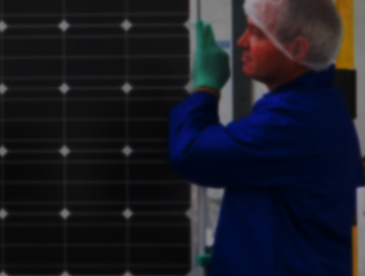 A person holding a solar panel