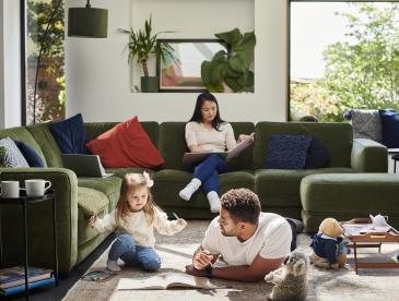 A family lounging in a living room