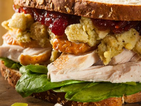 Close view of a sandwich made from Thanksgiving leftovers