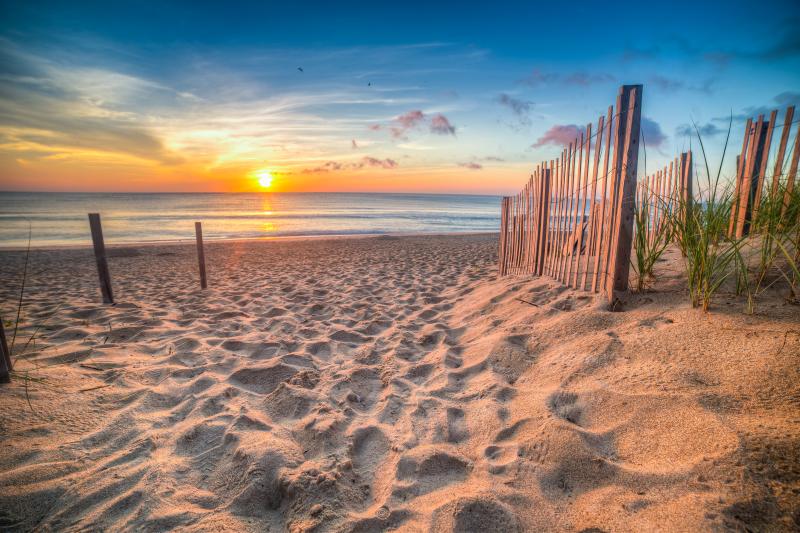Sandy beach and Atlantic Ocean at sunrise, Outer Banks, North Carolina, USA